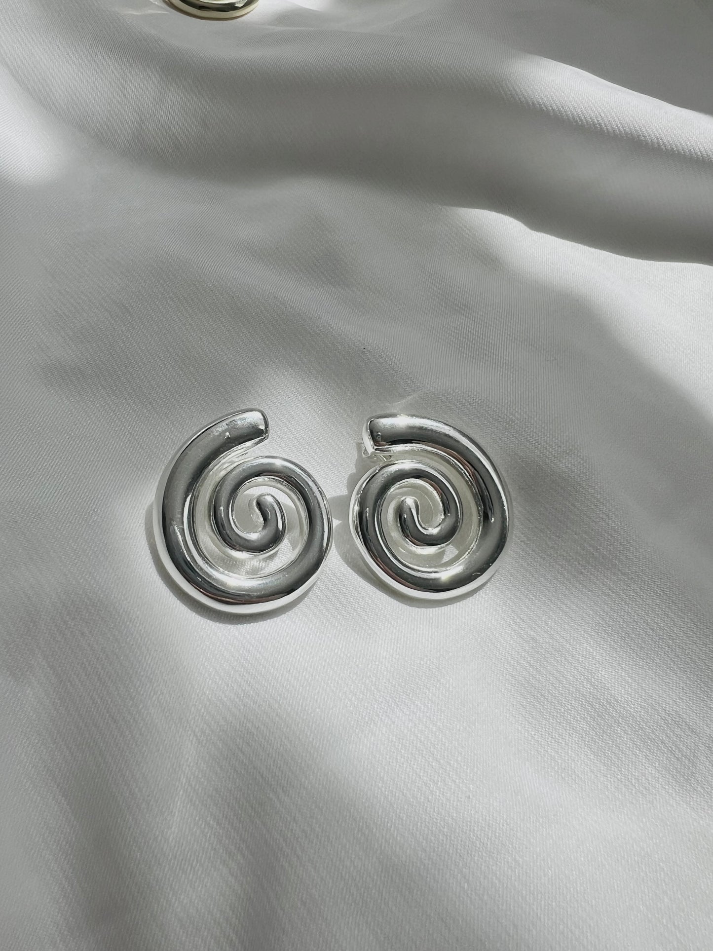 Aretes Caracol